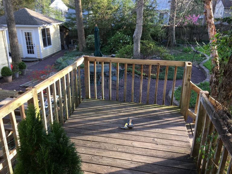 Final - only temporary - result is a 7' x 12' portion to allow safe egress from the back door until a few days before the deck contractor arrives.